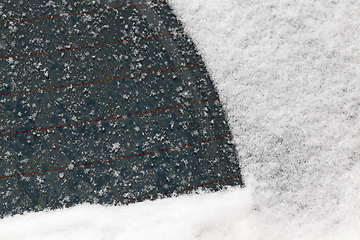 Image showing Snow on the car