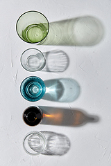 Image showing glassware dropping shadows on white surface