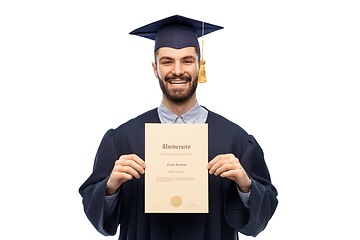 Image showing male graduate student in mortar board with diploma