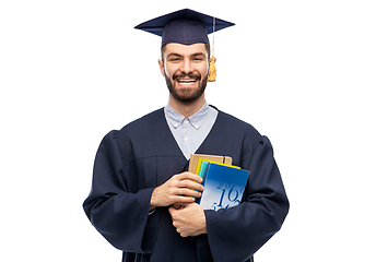 Image showing happy graduate student or bachelor with books