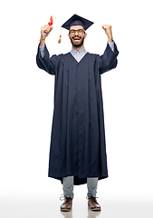 Image showing male graduate student in mortar board with diploma