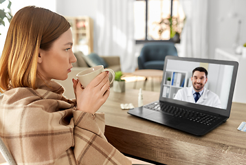 Image showing sick woman having video call with doctor at home