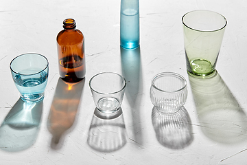 Image showing glassware dropping shadows on white surface