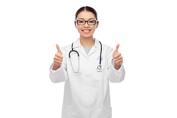 Image showing smiling asian female doctor showing thumbs up