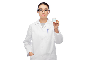 Image showing asian female doctor or nurse with medicine