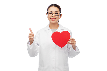 Image showing happy smiling asian female doctor with red heart