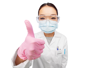 Image showing asian female doctor in mask showing thumbs up