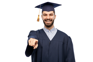 Image showing happy smiling graduate student pointing to you