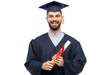 Image showing male graduate student in mortar board with diploma