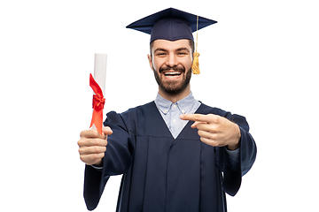 Image showing male graduate student in mortar board with diploma