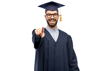 Image showing happy smiling graduate student pointing to you