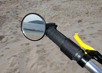 Image showing beach through the bike mirror