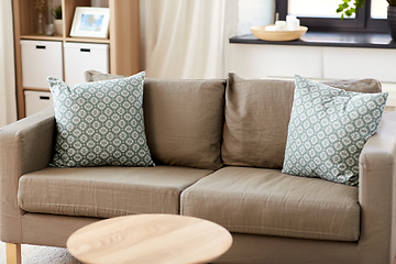 Image showing sofa with cushions at cozy home living room