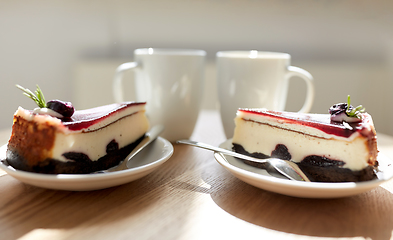 Image showing piece of chocolate cake on wooden table