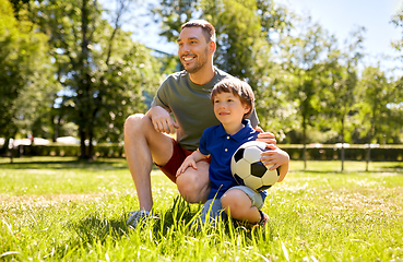 Image showing father and little son with soccer ball at park