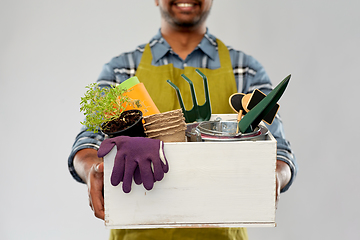 Image showing indian gardener or farmer with box of garden tools