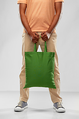 Image showing man with reusable canvas bag for food shopping