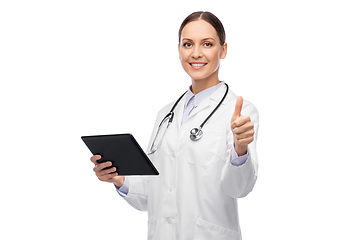 Image showing happy female doctor with tablet pc shows thumbs up