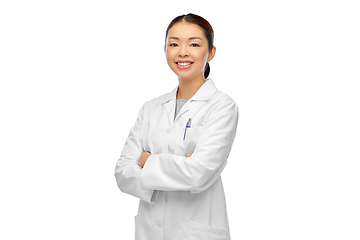 Image showing smiling asian female doctor with crossed arms