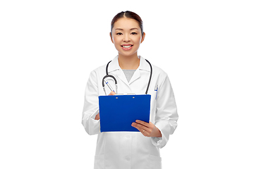 Image showing happy smiling asian female doctor with clipboard