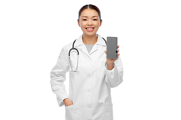 Image showing happy asian female doctor or nurse with smartphone