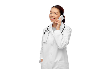 Image showing asian female doctor or nurse calling on smartphone