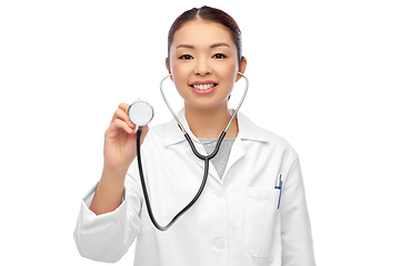 Image showing happy smiling asian female doctor in white coat