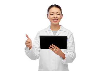 Image showing asian female doctor with tablet pc shows thumbs up