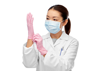 Image showing asian female doctor in medical mask and gloves