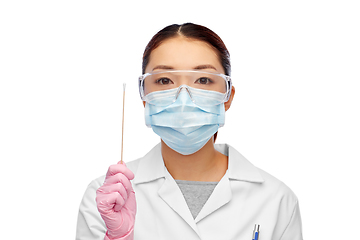 Image showing asian female doctor in mask with test cotton swab