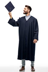 Image showing graduate student in bachelor gown with mortarboard