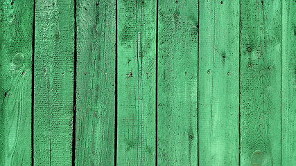 Image showing Texture of weathered wooden green painted fence