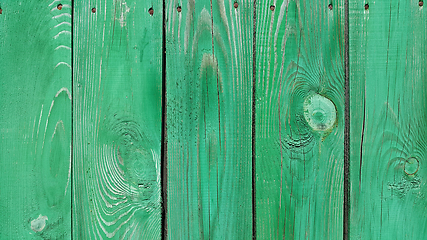 Image showing Texture of weathered wooden green painted fence