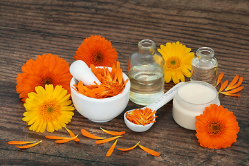 Image showing Preparation of Calendula Flowers for Skincare Ointment