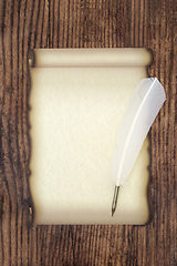 Image showing Parchment Paper Scroll with White Feather Quill Pen