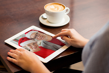 Image showing close up of woman with tablet pc having video call