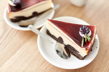 Image showing piece of chocolate cake on wooden table