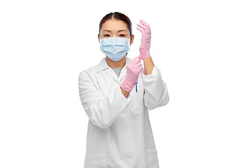 Image showing asian female doctor in medical mask and gloves