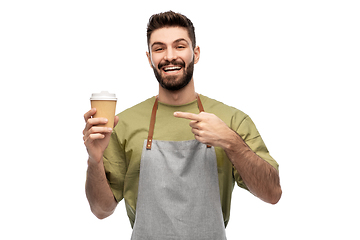 Image showing happy smiling barman in apron with takeaway coffee