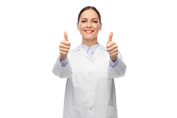 Image showing smiling female doctor showing thumbs up