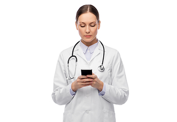 Image showing female doctor with stethoscope using smartphone