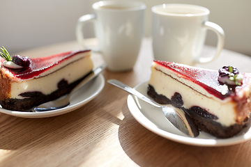 Image showing piece of chocolate cake on wooden table