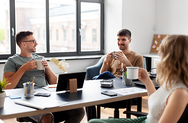 Image showing team of startuppers drinking coffee at office