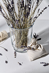 Image showing sachet bag, rope and lavender flowers in vase