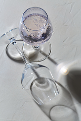 Image showing wine glasses dropping shadows on white surface