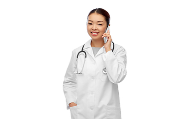 Image showing asian female doctor or nurse calling on smartphone