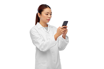 Image showing asian female doctor or nurse with smartphone