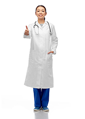 Image showing smiling asian female doctor showing thumbs up