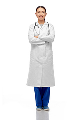 Image showing happy smiling asian female doctor in white coat