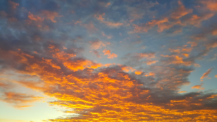 Image showing Fiery sunrise sky background